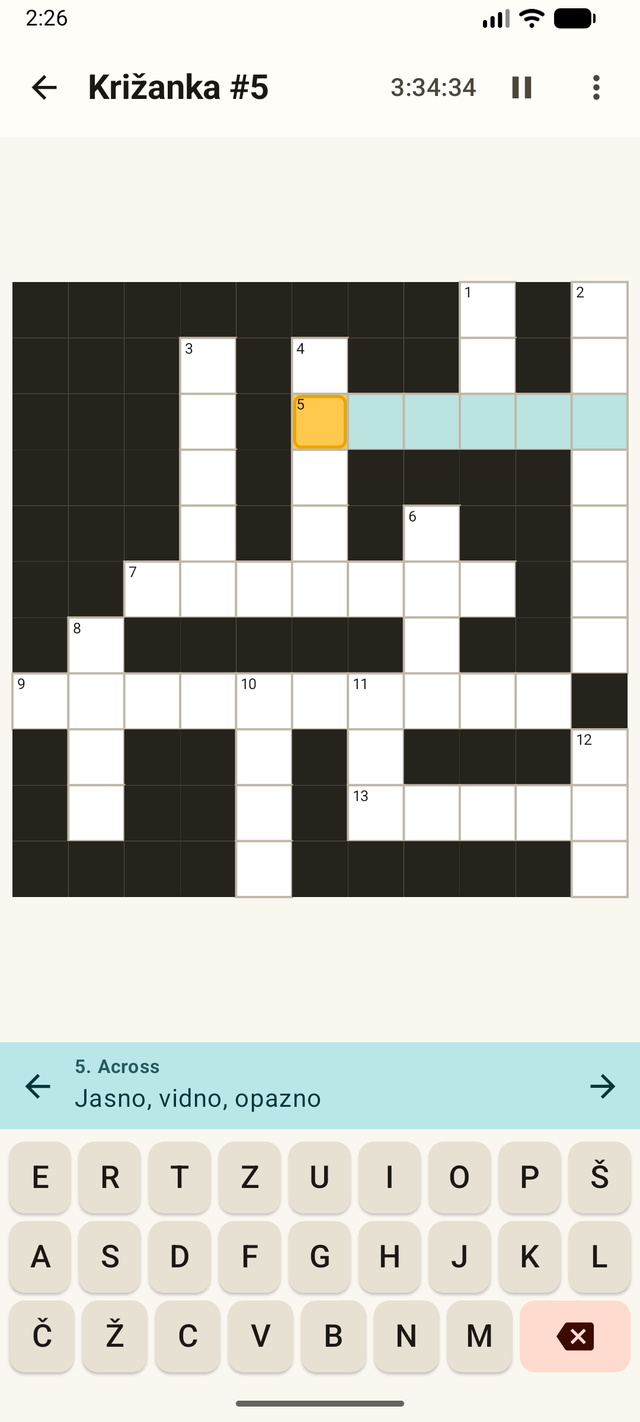Križanke crossword gameplay with the on-screen keyboard